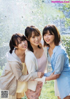A group of young women sitting on top of a magazine cover.