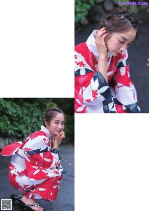 A woman in a red and white kimono leaning against a wall.