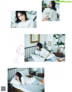 A woman sitting on a chair in a room with plants.